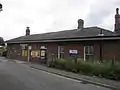 The station as viewed from the roadside drop-off point.