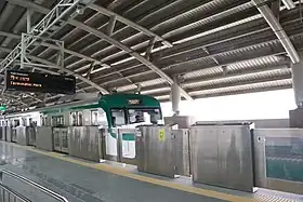 Train and platform at Agargaon metro station