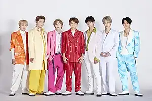 Travis Japan in colorful costumes to celebrate their official worldwide debut single
