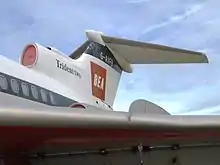 A left-quarter view of a jet airliner wing and tailplane. On the tail fin are the words 'Trident Two' and the letters 'BEA' and G-AFVB'.