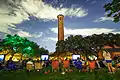 Students watch a movie by Trinity University's most notable feature, Murchison Tower
