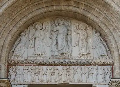 The tympanum of the side entrance of Saint-Sernin of Toulouse, (c. 1115) shows the Ascension of Christ, surrounded by angels, in a simple composition of standing figures.