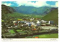 Vintage shot of University of Hawaii, Manoa, with the back of the valley in the background