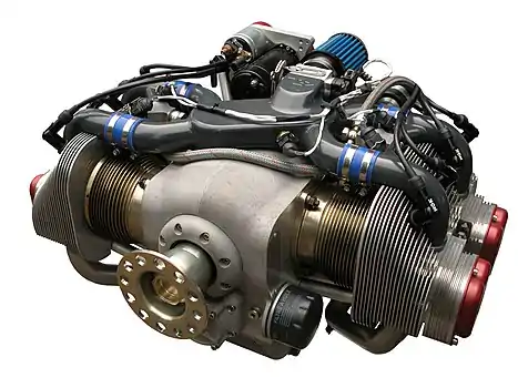 Image 15Flat-four enginePhotograph: ULPower Aero EnginesThe ULPower UL260i, a flat-four engine produced by ULPower Aero Engines of Belgium. Flat-four engines are flat engines with four cylinders arranged horizontally in two banks of two cylinders on each side of a central crankcase; they can be used in cars, motorcycles, or aircraft. This type of engine tends to be well-balanced and have efficient cooling, but is expensive to manufacture and considerably wider than other engines.More selected pictures