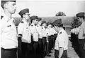 Air Force Chaplain School Commandant Colonel (Chaplain) Donald Harlin inspects chaplain-candidates attending a two-week training course at the school during the 80s when it was located at Maxwell AFB