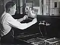 In the dark room at the United States Naval Photographic Science Lab at Anacostia Naval Air Station, Washington, D.C..