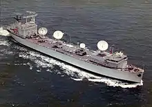Vanguard (T-AGM-19) seen as a NASA Skylab tracking ship. Note the tracking radar and telemetry antennas.