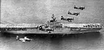 Boxer with Douglas AD-4W and Grumman F9F-5P off Korea in 1955