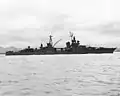 The foremast was cut down and reduced to save top weight, and the mainmast was moved forward and mounted around the aft smoke stack in 1945