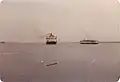 The SS Naushon passing the MV&nbsp;Uncatena in Nantucket harbor, September 1979.