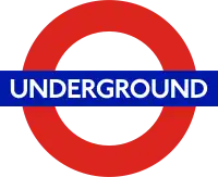 London Underground logo, known as the roundel, is made of a red circle with a horizontal blue bar.