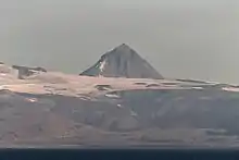 Pogramni (6569ft, 2002m) volcano as seen from the Unimak Pass in the morning light.