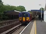 Looking north, with unit 5734 awaiting return to London. The up (London-bound) platform on the left has never seen passenger use.