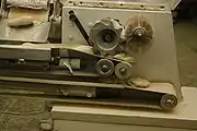 5. Pressing produces the characteristic shape of the roll.