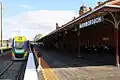 Southbound view, with VLocity set VL38 on Platform 1, in July 2010