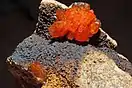 Crystals of vanadinite and siderite, from Taouz Er Rachidia Province, Drâa-Tafilalet Region, Morocco