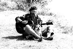 Vivian with his bulldog Bones, towpath, Shepperton, England, 1980