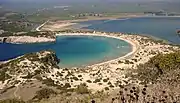 View from Nestor's Cave looking down to the beach and the lagoon