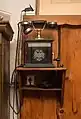 Image 8Historical telephone with the German imperial eagle and the heraldic shield of the House of Hohenzollern dynasty; Vollmer's Mill, Seebach, Baden-Württemberg, Germany