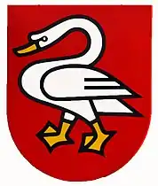 The Swiss municipality of Horgen uses a depiction of a swan on its flag. The swan symbolizes the location of the town at Lake Zurich, as well as Horgen's political status as administrative capital of the same named cantonal district.