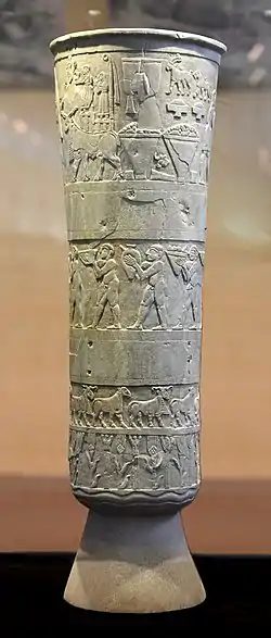 The Warka Vase of Sumer, a very early survival works of narrative relief, c. 3200–3000 BC. Alabaster. National Museum of Iraq.
