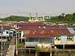 Stilt houses in Mukim Tamoi, with Duli Pengiran Muda Mahkota Pengiran Muda Haji Al-Muhtadee Billah Mosque in background