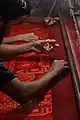 Jamdani weaving in a loom of the village