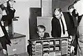 MSFC officials looking at an LVDC