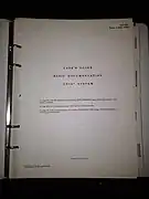 Paper punched with 7 holes, in a 4-ring binder