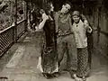 Still from the Exhibitors Herald showing a scene with William Russell and Olga Grey