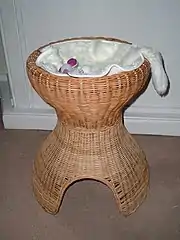 A handmade wickerwork cat tree