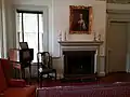 A fire place and television