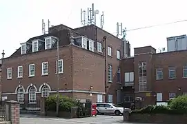 Cell site placed atop an existing building