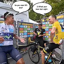 Two cyclists are talking to each other with cartoon speech bubbles overlaid. The first cyclist asks the other "Do you even lift bro?" and the second cyclist responds "I lifted your mom last night."