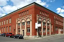 Photograph of a brick industrial building