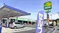A curved Nobori used to advertise a Cosmo petrol station