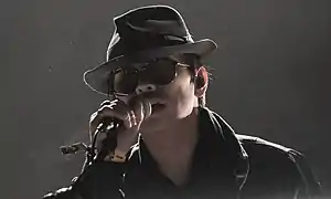 Zhu performing in 2018