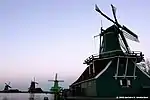 Typical Dutch windmills at sunset, Zaanse Schans
