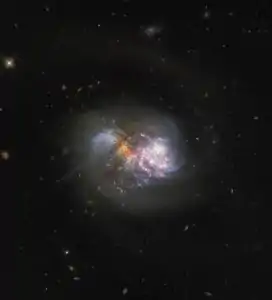 The interacting galaxy pair IC 1623, which lies around 275 million light-years away in the constellation Cetus (The Whale).
