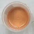 Pinkish urine due to consumption of beetroots.