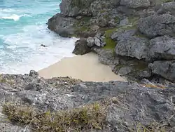 Drive along Maloney Drive Christchurch almost to the end of the road. Take the off-road track to the north past a farm and after about a kilometre you will see the beach north east of Long Beach from above.