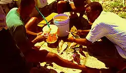 Go'frey on the right often cleaned and filleted fish very expertly for other divers by the Crane pipe,